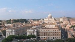 A view of the headquarters of Vatican News with St. Peter's in the background